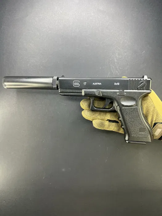 Іграшковий металевий пістолет з глушником Glock 17 C15A+ на кульках 6 мм - Зображення 6