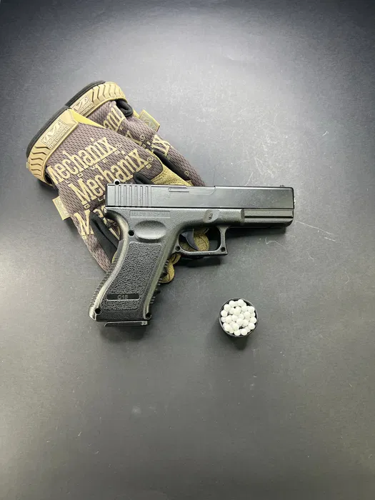 Іграшковий металевий пістолет з глушником Glock 17 C15A+ на кульках 6 мм - Зображення 2